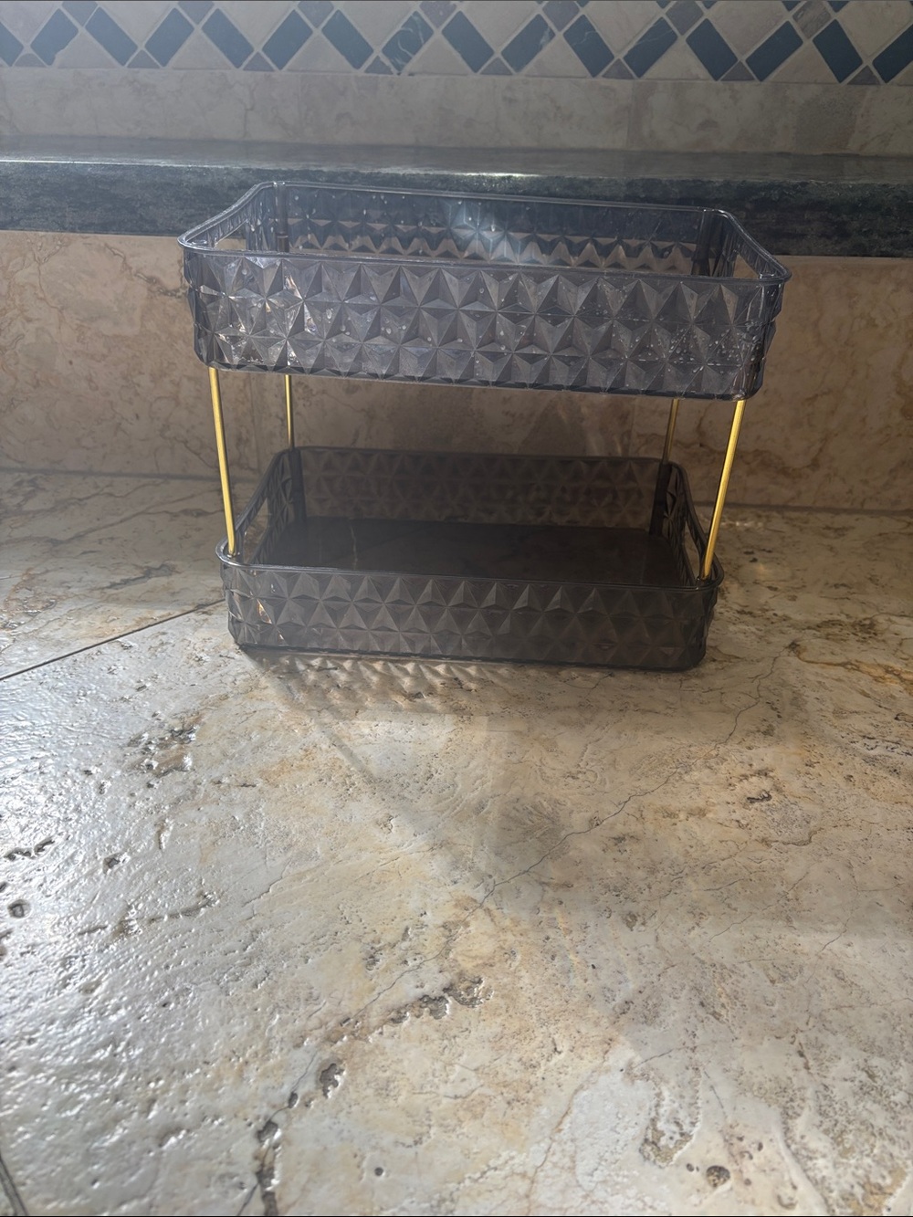 Smoked Gray Two-Tier Cosmetic Organizer with Gold Supports